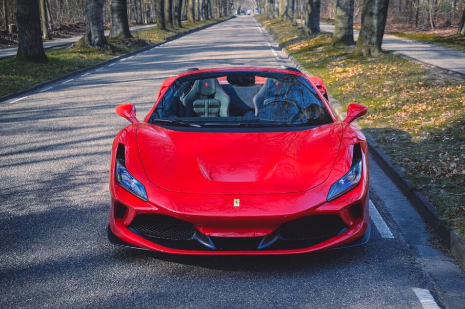 Why is Ferrari color red?